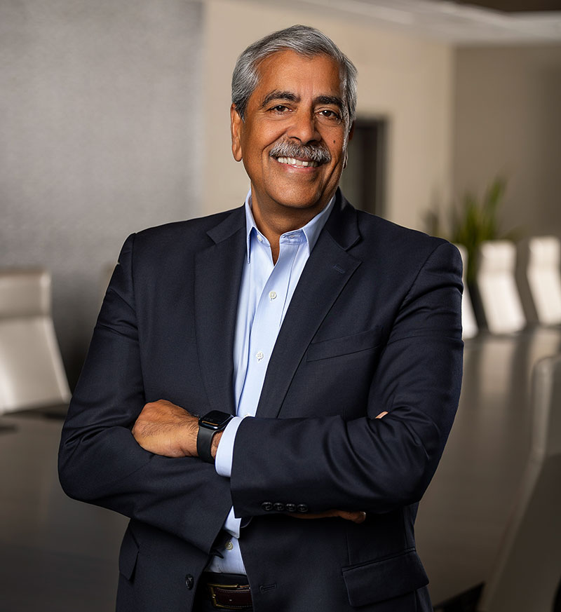 Headshot of ESL President and CEO Faheem Masood